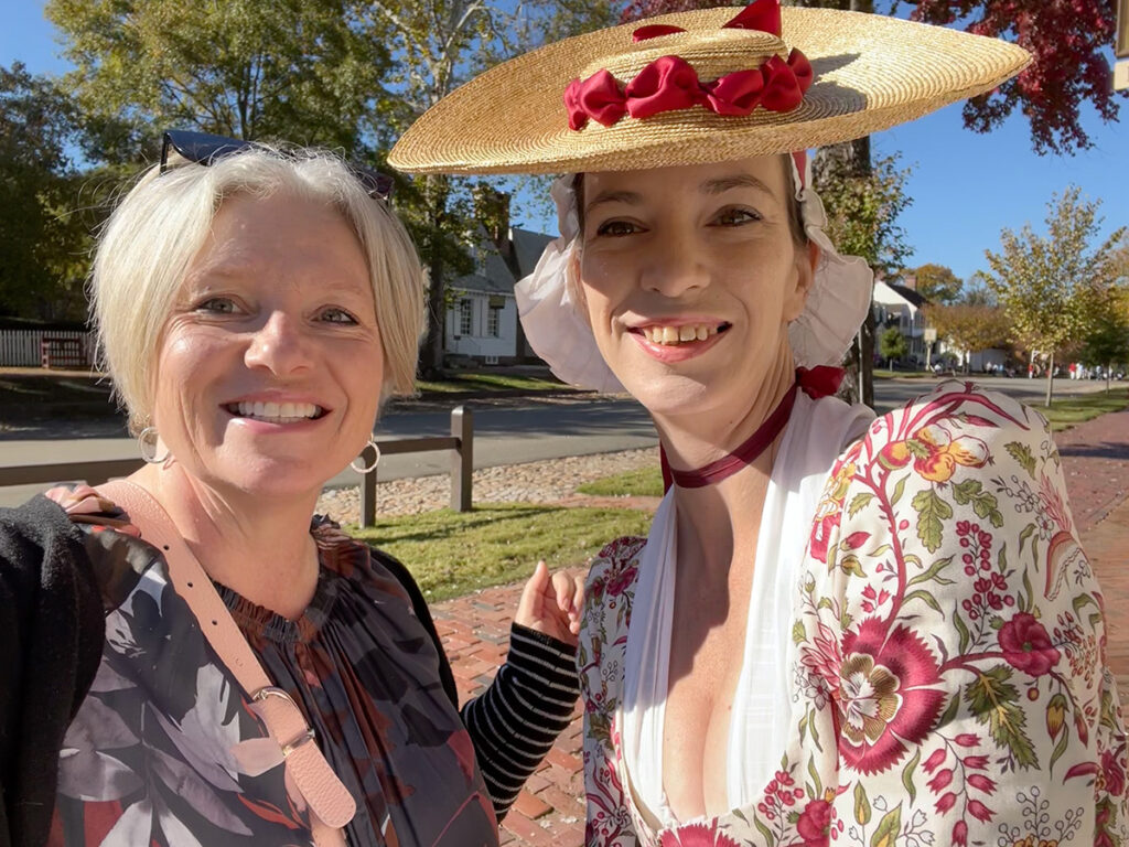 Megan with lady in costume, Colonial Williamsburg