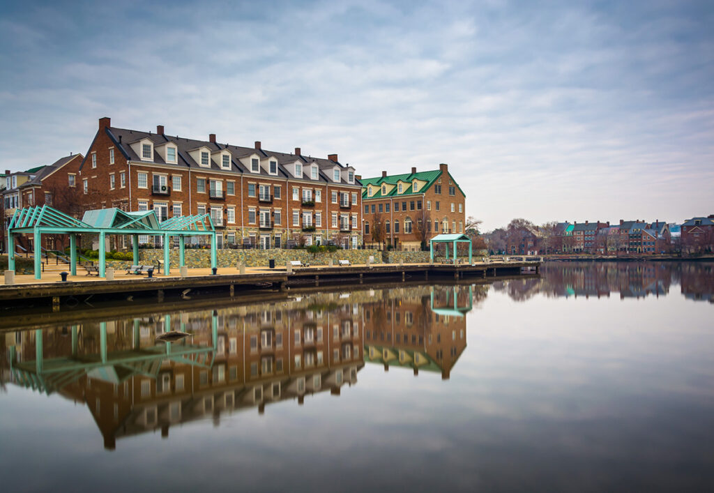 Buildings reflecting on water Old Town Alexandria