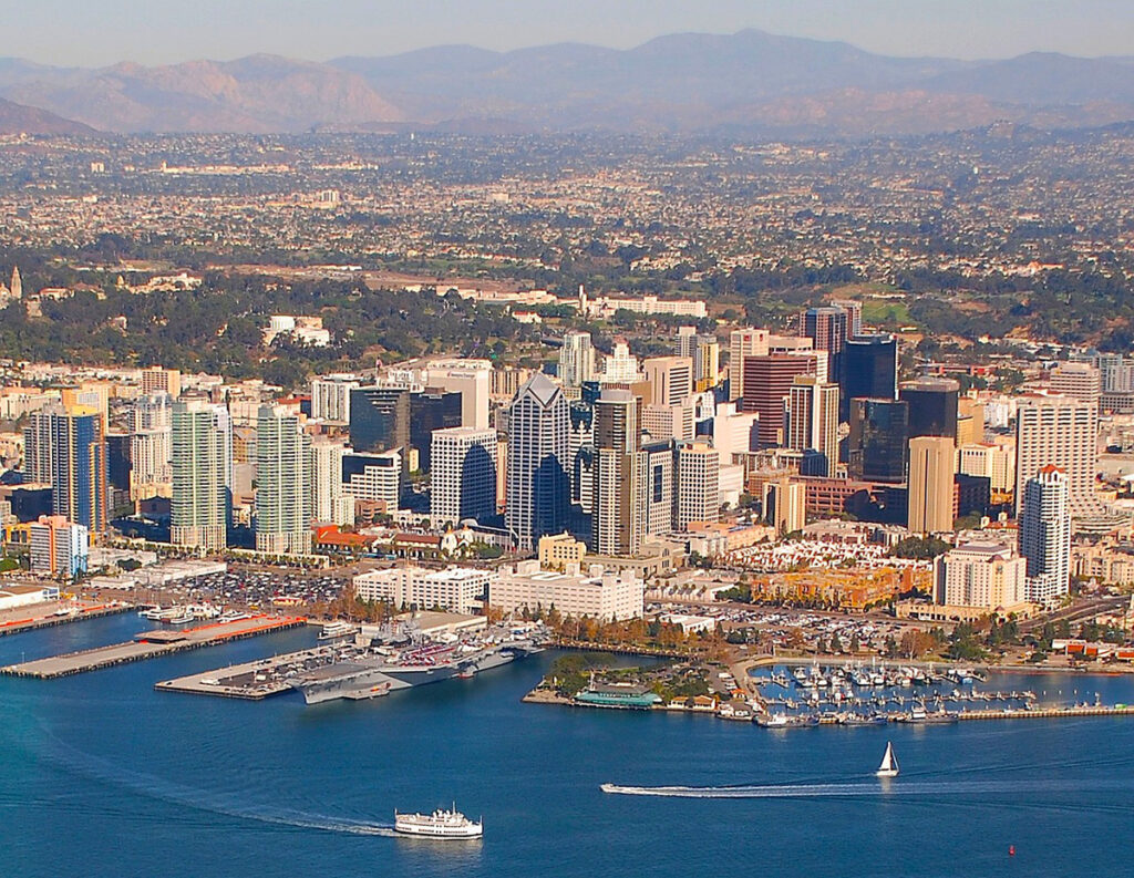 Aerial view of San Diego waterfront with USS Midway